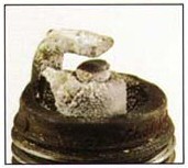 Spark plug deposits